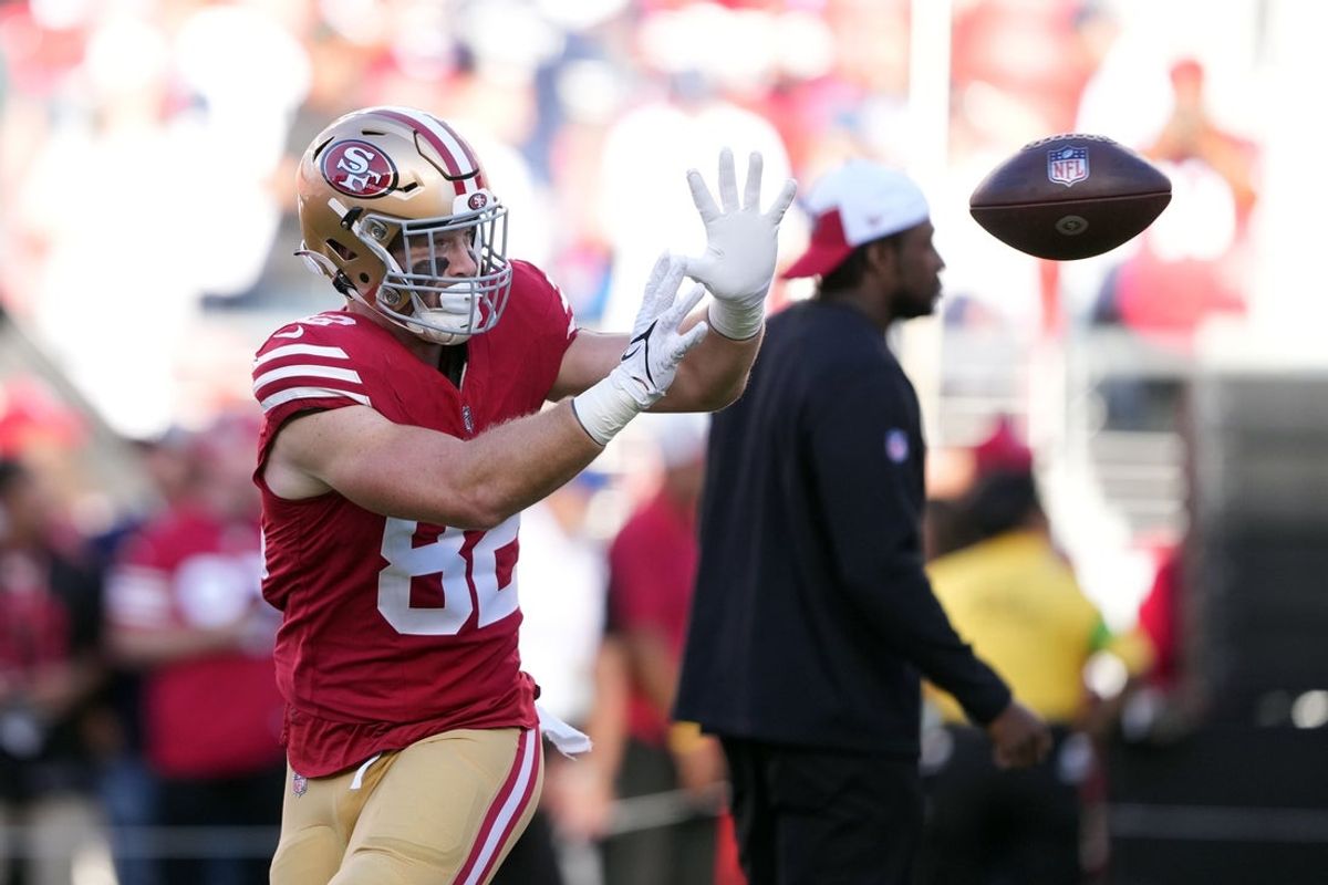 Oct 8, 2023; Santa Clara, California, USA; San Francisco 49ers tight end Ross Dwelley (82) warms up before the game against the Dallas Cowboys at Levi's Stadium. Mandatory Credit: Darren Yamashita-Imagn Images