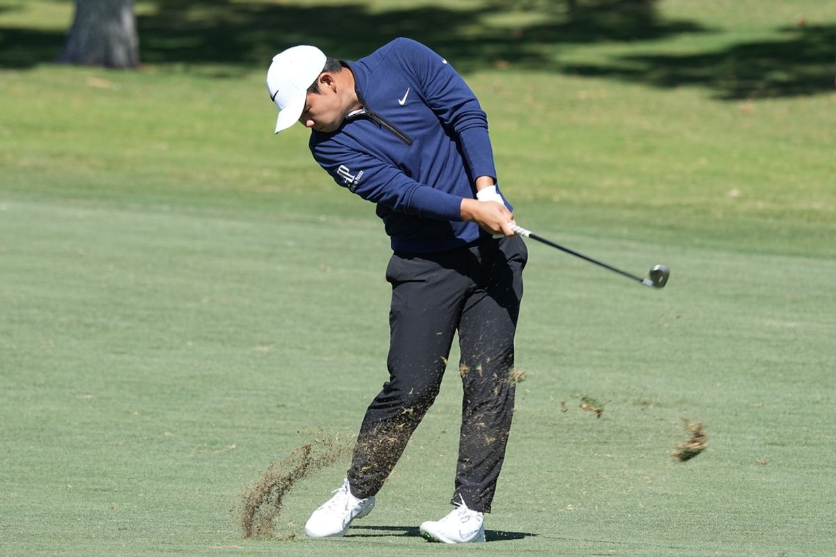 Oct 12, 2023; Las Vegas, Nevada, USA; Tom Kim hits from the fairway on the first hole during the first round of the Shriners Children's Open golf tournament at TPC Summerlin. Mandatory Credit: Ray Acevedo-Imagn Images