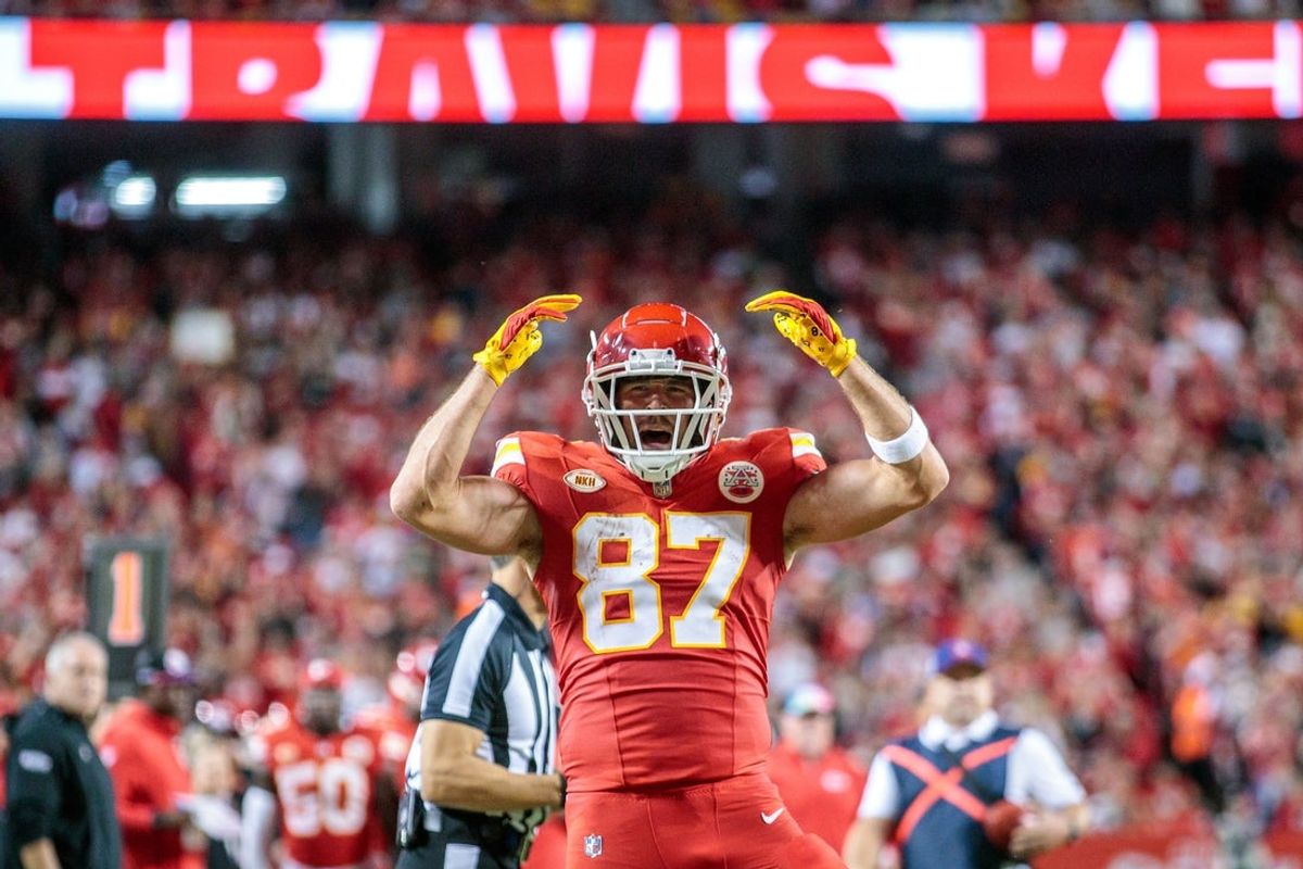 Oct 12, 2023; Kansas City, Missouri, USA; Kansas City Chiefs tight end Travis Kelce (87) celebrates after a play during the second quarter against the Denver Broncos at GEHA Field at Arrowhead Stadium. Mandatory Credit: William Purnell-Imagn Images