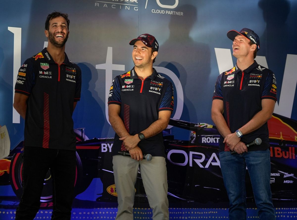Oracle Red Bull Racing drivers Daniel Ricciardo, left to right, Sergio Perez and Max Verstappen speak at the Red Bull Fan Zone, a private event at Oracle headquarters, on Wednesday October 18, 2023. at the Red Bull Fan Zone, a private event at Oracle headquarters, on Wednesday October 18, 2023.