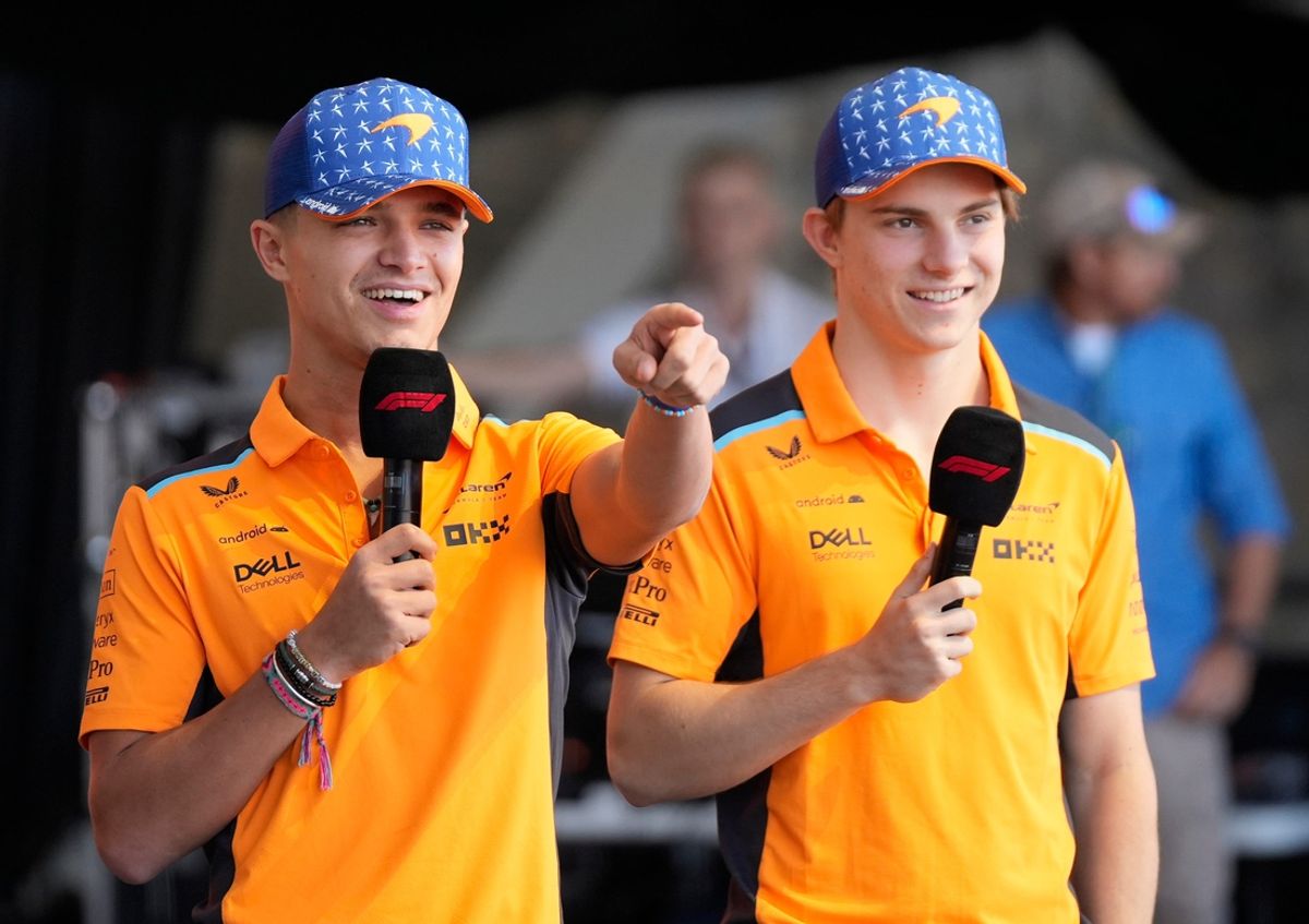 McLaren driver Lando Norris of United Kingdom, left, and McLaren driver Oscar Piastri of Australia, talk to fans at the Driver Engagement event at the Formula 1 Lenovo United States Grand Prix at Circuit of the Americas on Friday October 20, 2023.