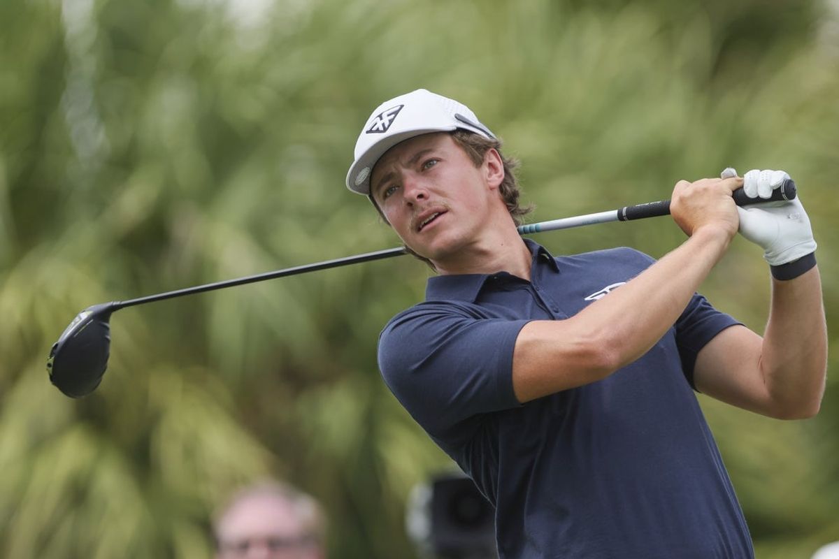 Oct 20, 2023; Doral, Florida, USA; James Piot plays his shot from the eighth tee during the first round of the LIV Golf Miami golf tournament at Trump National Doral. Mandatory Credit: Sam Navarro-Imagn Images