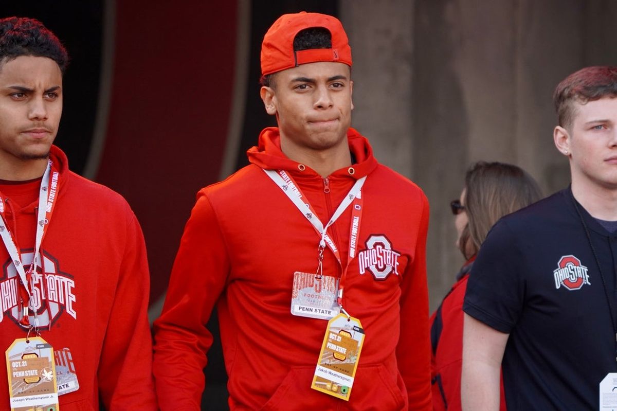 Recruit Jakob Weatherspoon watches Ohio State warm up before playing Penn State Oct. 21, 2023 at Ohio Stadium.