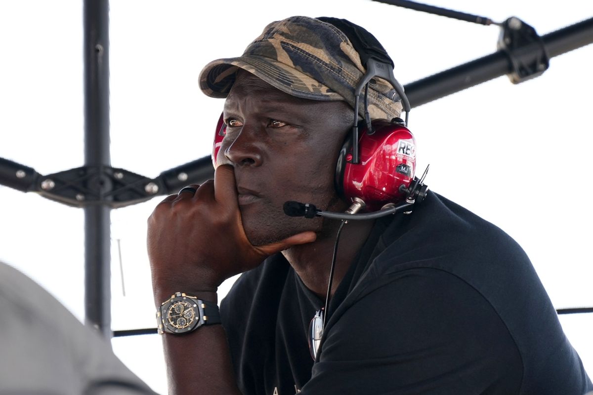 Oct 22, 2023; Homestead, Florida, USA; 23XI Team co-owner Michael Jordan sits atop of the pitbox during the 4EVER 400 presented by Mobil 1 at Homestead-Miami Speedway. Mandatory Credit: Jasen Vinlove-Imagn Images