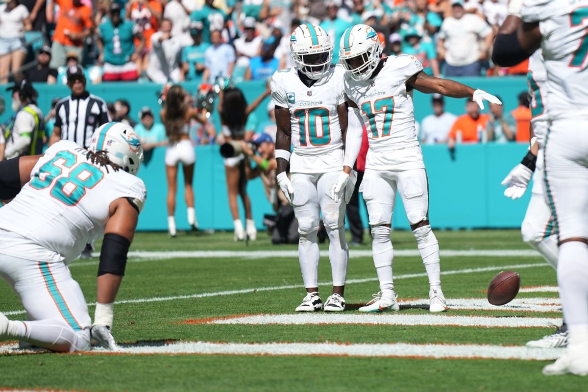 Miami Dolphins wide receiver Jaylen Waddle (17) celebrates his touchdown with wide receiver Tyreek Hill (10) during the first half of an NFL game against the Carolina Panthers at Hard Rock Stadium in Miami Gardens, Oct. 15, 2023.
