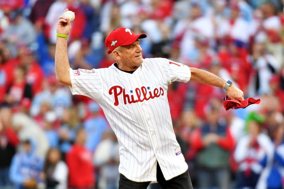 Oct 23, 2023; Philadelphia, Pennsylvania, USA; Philadelphia Phillies former player Larry Bowa throws the ceremonial first pitch before in game six of the NLCS for the 2023 MLB playoffs between the Philadelphia Phillies and the Arizona Diamondbacks at Citizens Bank Park. Mandatory Credit: Eric Hartline-Imagn Images