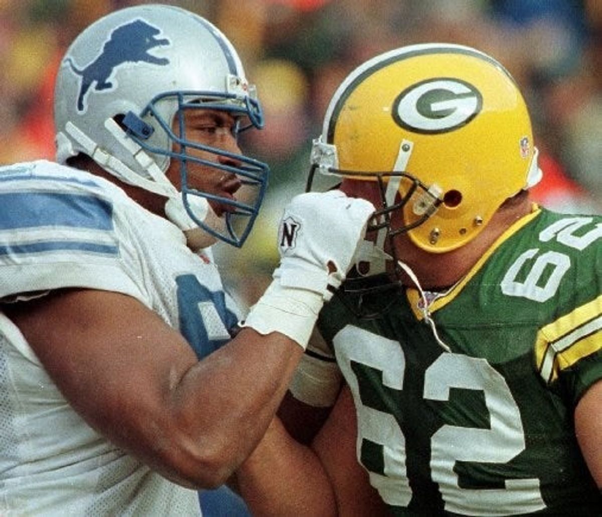 Detroit LIons Tracy Scroggins exchanges words with Green Bay Packers Marco Rivera after a play during the second quarter of their game Sunday, December 10, 2000 at Lambeau Field in Green Bay, Wis.(Milwaukee Journal Sentinel photo by Dale Guldan)
