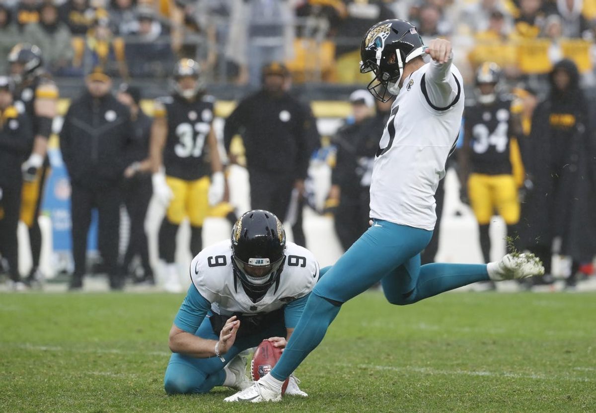 Oct 29, 2023; Pittsburgh, Pennsylvania, USA; Jacksonville Jaguars place kicker Brandon McManus (10) kicks a field goal against the Pittsburgh Steelers during the fourth quarter at Acrisure Stadium. Mandatory Credit: Charles LeClaire-USA TODAY Sports
