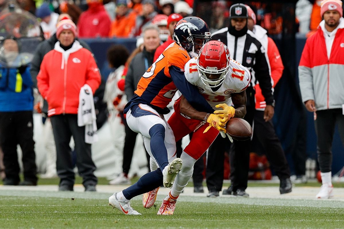 Oct 29, 2023; Denver, Colorado, USA; Denver Broncos cornerback Fabian Moreau (23) breaks up a pass intended for Kansas City Chiefs wide receiver Marquez Valdes-Scantling (11) in the second quarter at Empower Field at Mile High. Mandatory Credit: Isaiah J. Downing-USA TODAY Sports