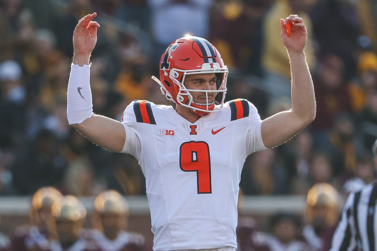 Nov 4, 2023; Minneapolis, Minnesota, USA; Illinois Fighting Illini quarterback Luke Altmyer (9) celebrates his touchdown pass to wide receiver Isaiah Williams (1) during the first half against the Minnesota Golden Gophers at Huntington Bank Stadium. Mandatory Credit: Matt Krohn-USA TODAY Sports
