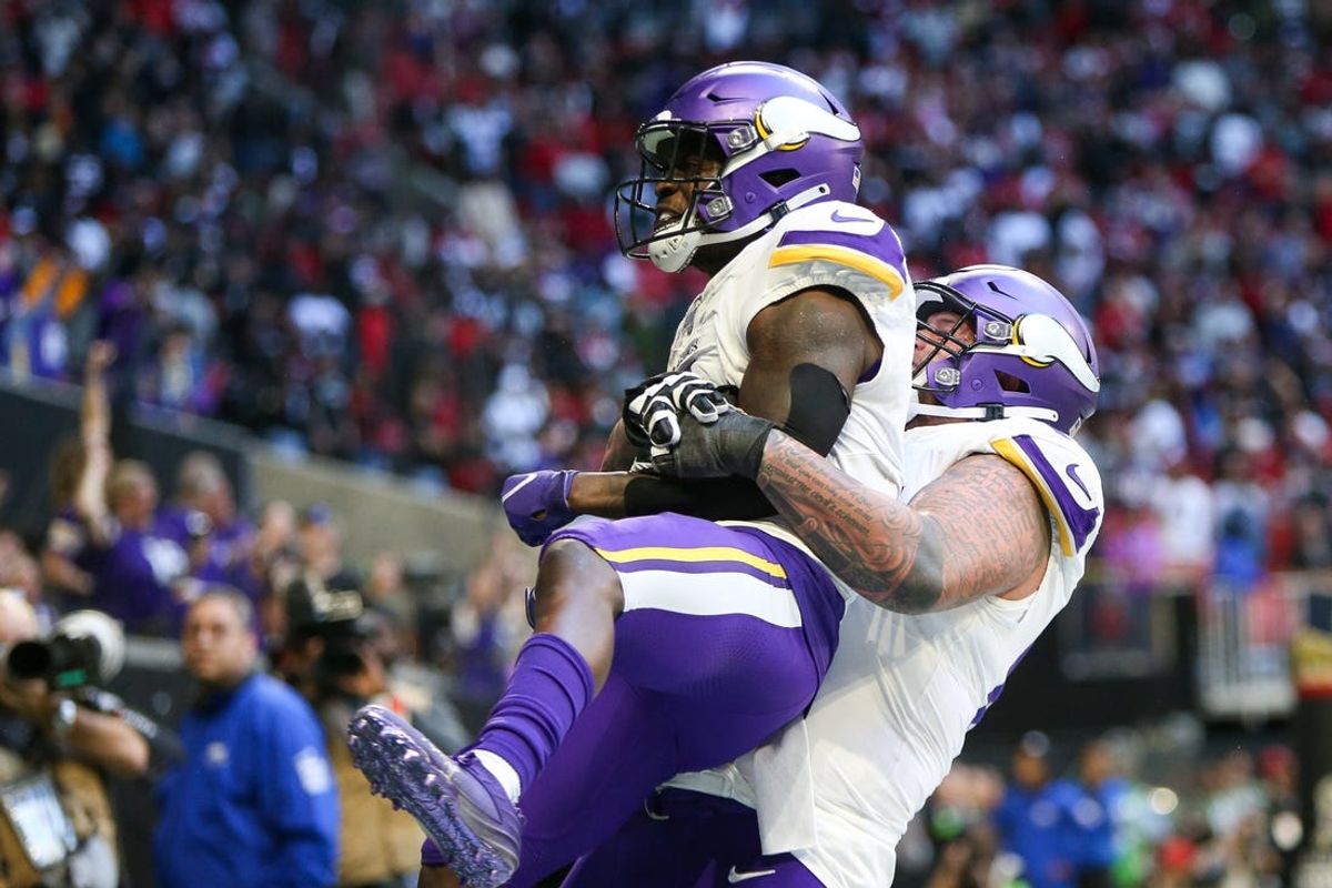 Nov 5, 2023; Atlanta, Georgia, USA; Minnesota Vikings wide receiver Brandon Powell (4) celebrates after a touchdown with guard Dalton Risner (66) against the Atlanta Falcons in the second half at Mercedes-Benz Stadium. Mandatory Credit: Brett Davis-USA TODAY Sports