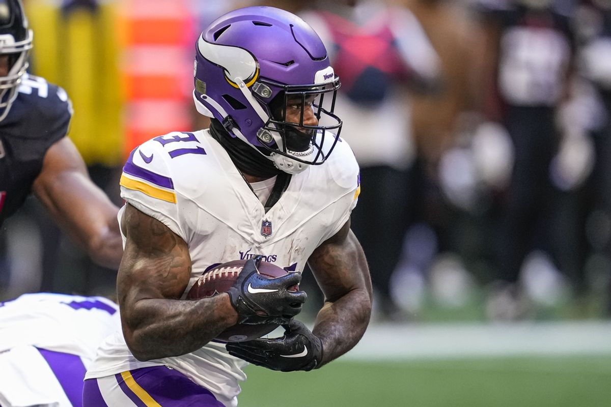 Nov 5, 2023; Atlanta, Georgia, USA; Minnesota Vikings running back Cam Akers (31) runs with the ball against the Atlanta Falcons at Mercedes-Benz Stadium. Mandatory Credit: Dale Zanine-USA TODAY Sports