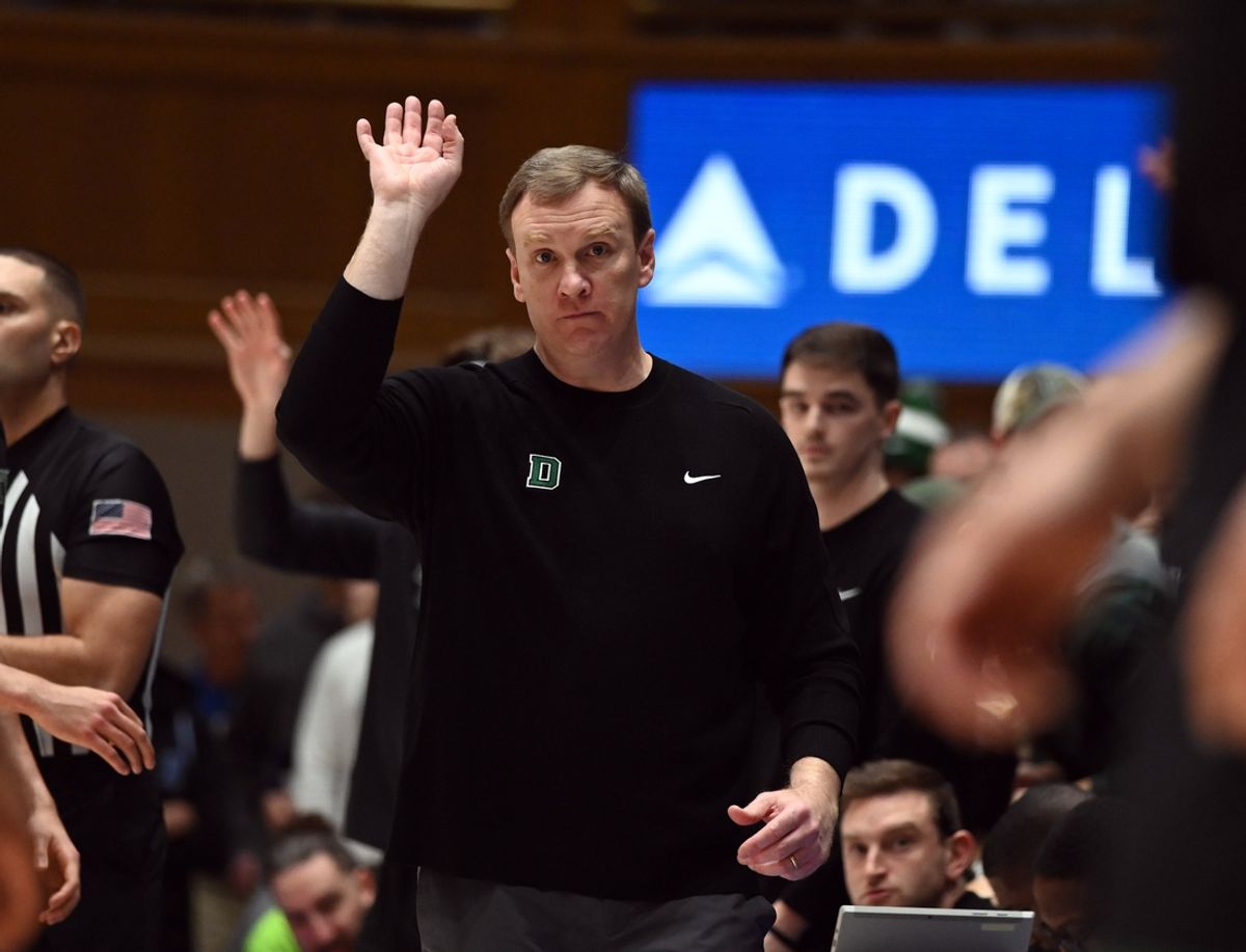 Nov 6, 2023; Durham, North Carolina, USA; Dartmouth Big Green head coach David McLaughlin directs his team during the first half against the Duke Blue Devils at Cameron Indoor Stadium. Mandatory Credit: Rob Kinnan-Imagn Images