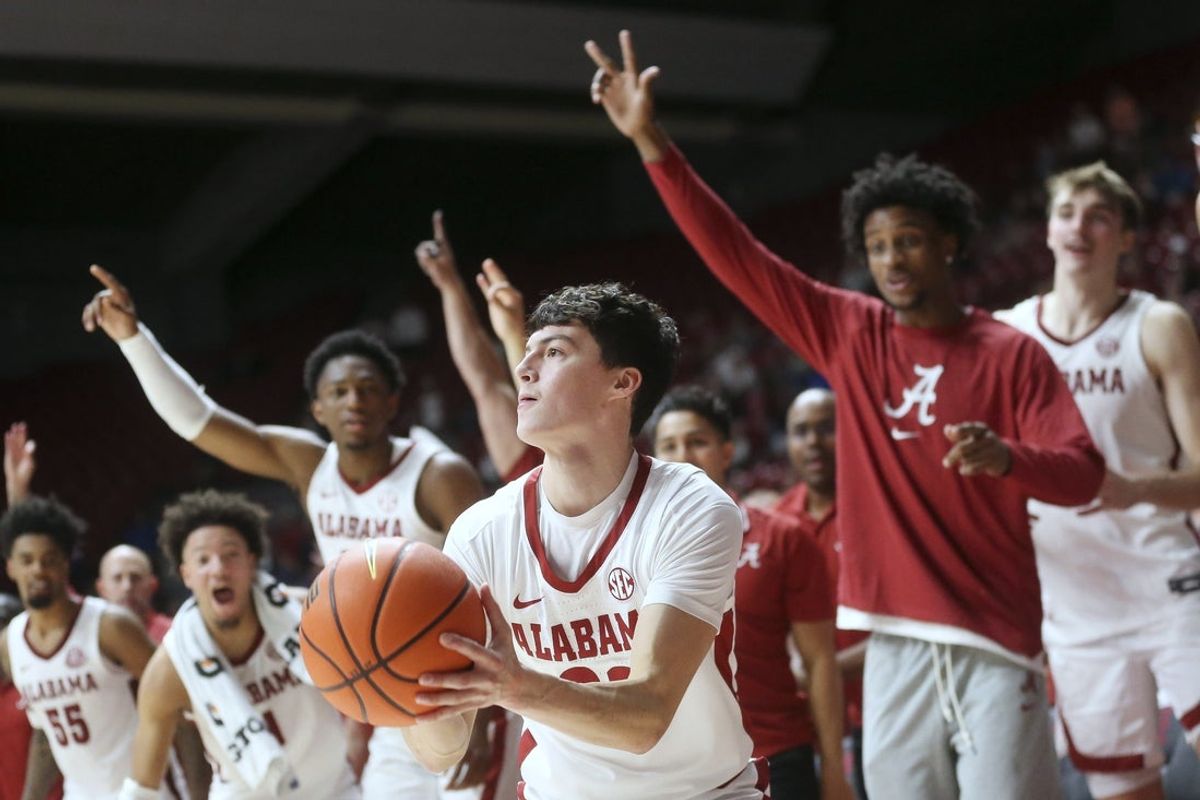 Nov 6, 2023; Tuscaloosa, Alabama, USA;  Alabama guard Kai Spears (32) a walk on guard, takes a three late in the game at Coleman Coliseum. Mandatory Credit: Gary Cosby Jr.-Imagn Images