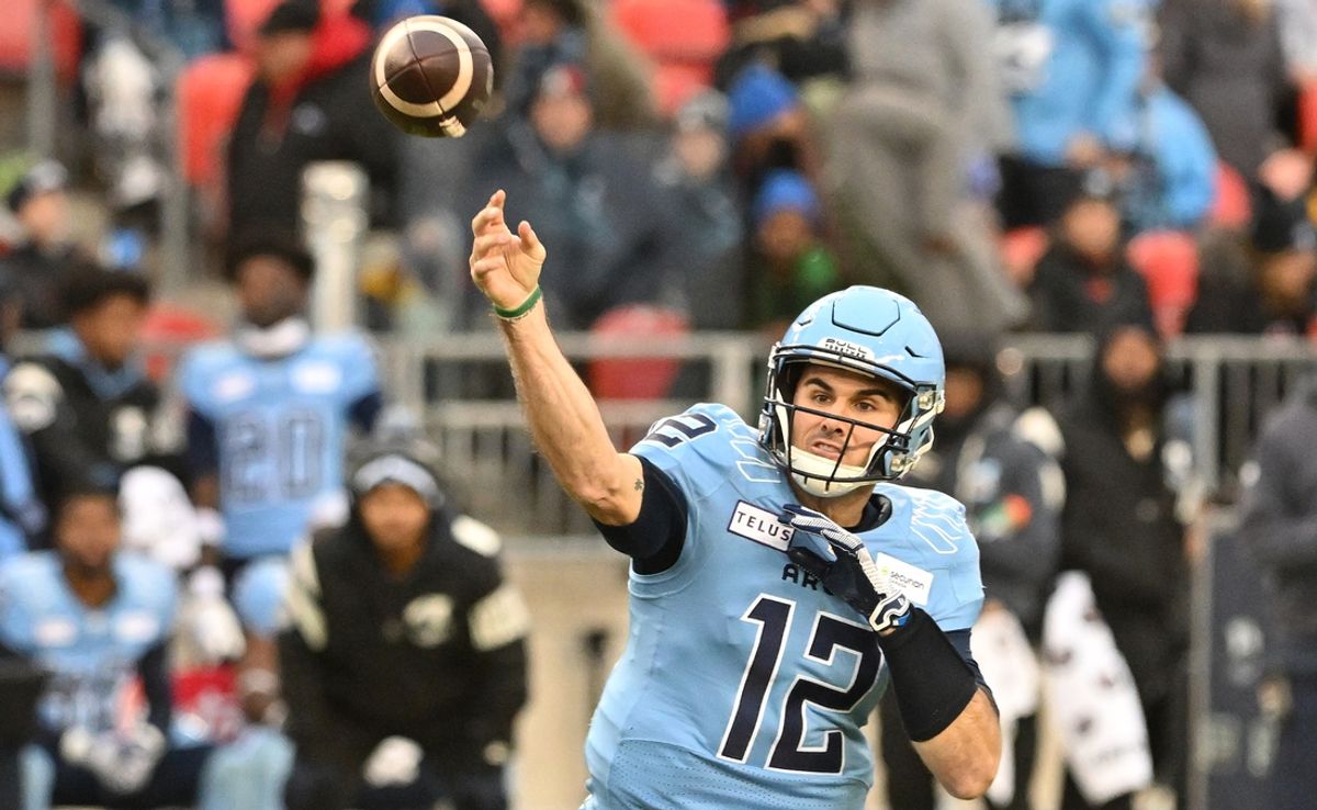 Nov 11, 2023; Toronto, Ontario, CAN;  Toronto Argonauts quarterback Chad Kelly (12) throws a pass against the Montreal Alouettes in the first half at BMO Field. Mandatory Credit: Dan Hamilton-Imagn Images