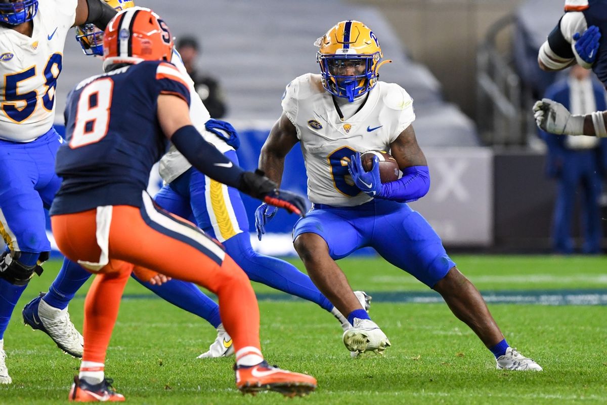 Nov 11, 2023; New York, New York, USA;  Pittsburgh Panthers running back Rodney Hammond Jr. (6) runs the ball defended by Syracuse Orange defensive back Justin Barron (8) during the second half at Yankee Stadium. Mandatory Credit: Dennis Schneidler-USA TODAY Sports