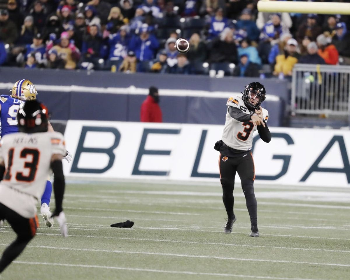 Nov 11, 2023; Winnipeg, Manitoba, CAN;  BC Lions quarterback Vernon Adams Jr. (3) looks downfield to make a pass to wide receiver Alexander Hollins (13) during the second half of the game against the Winnipeg Blue Bombers at IG Field. Winnipeg wins 24-13 to advance to Grey cup. Mandatory Credit: Bruce Fedyck-USA TODAY Sports