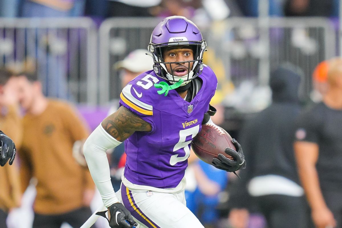 Nov 12, 2023; Minneapolis, Minnesota, USA; Minnesota Vikings cornerback Mekhi Blackmon (5) intercepts the ball against the New Orleans Saints in the fourth quarter at U.S. Bank Stadium. Mandatory Credit: Brad Rempel-USA TODAY Sports