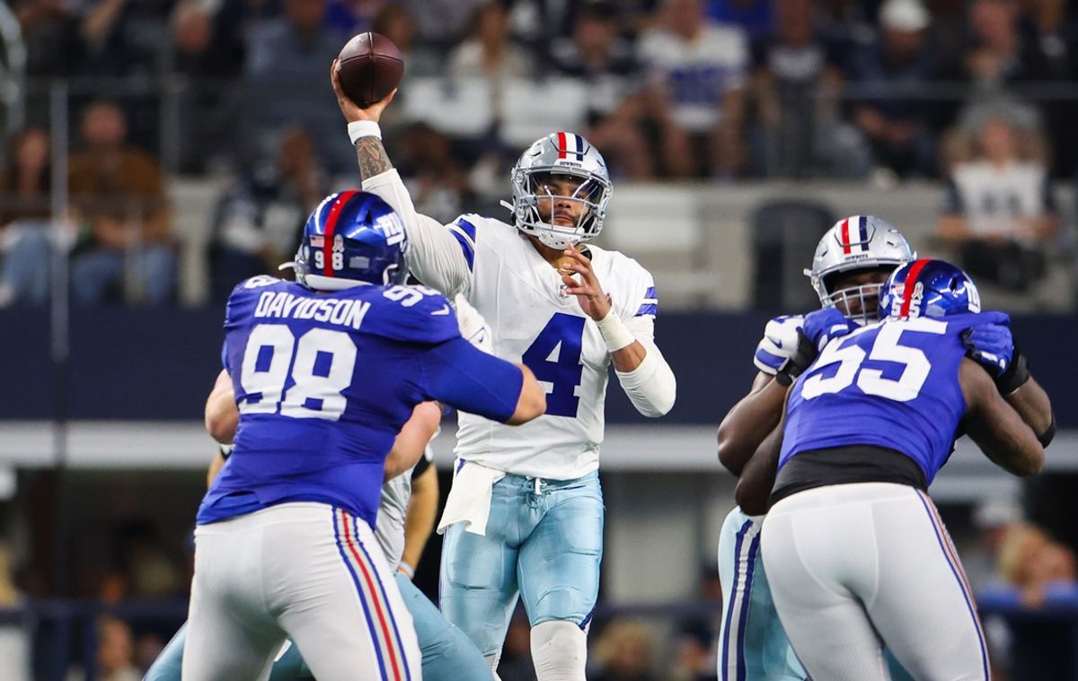 Nov 12, 2023; Arlington, Texas, USA;  Dallas Cowboys quarterback Dak Prescott (4) throws during the first half against the New York Giants at AT&T Stadium. Mandatory Credit: Kevin Jairaj-Imagn Images
