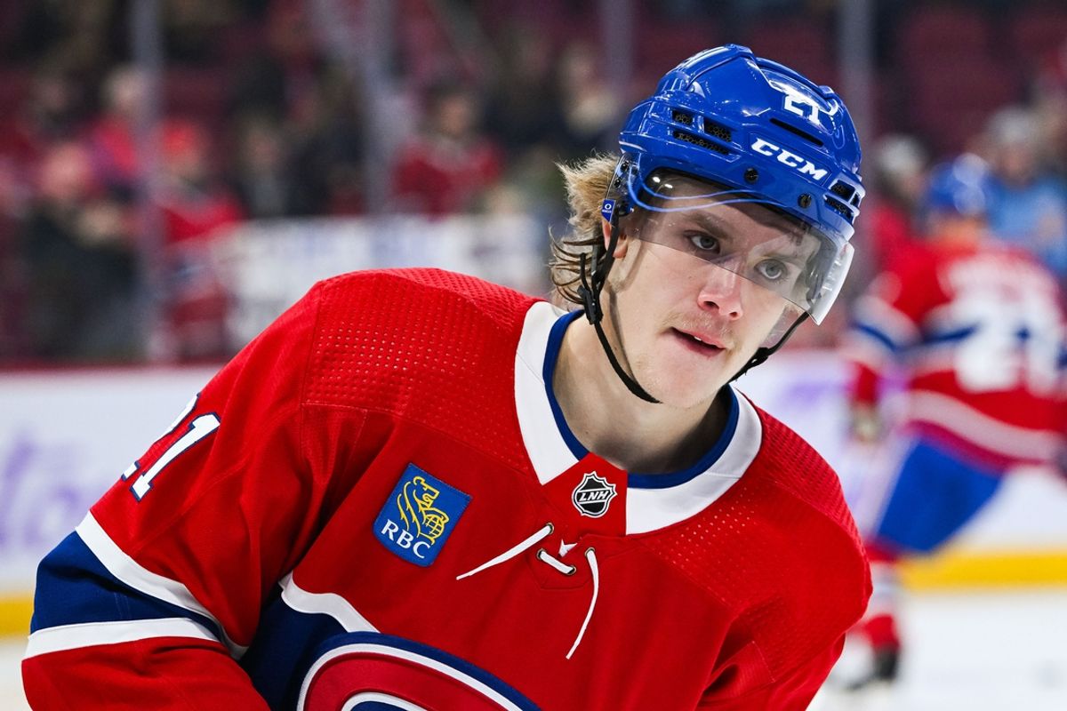 Nov 12, 2023; Montreal, Quebec, CAN; Montreal Canadiens defenseman Kaiden Guhle (21) looks on during warm-up before the game against the Vancouver Canucks at Bell Centre. Mandatory Credit: David Kirouac-Imagn Images