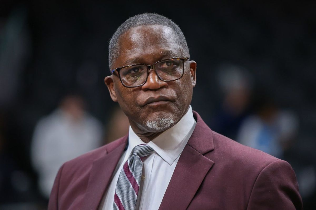 Nov 15, 2023; Atlanta, Georgia, USA; Former Atlanta Hawks forward Dominique Wilkins on the court before a game against the New York Knicks at State Farm Arena. Mandatory Credit: Brett Davis-Imagn Images