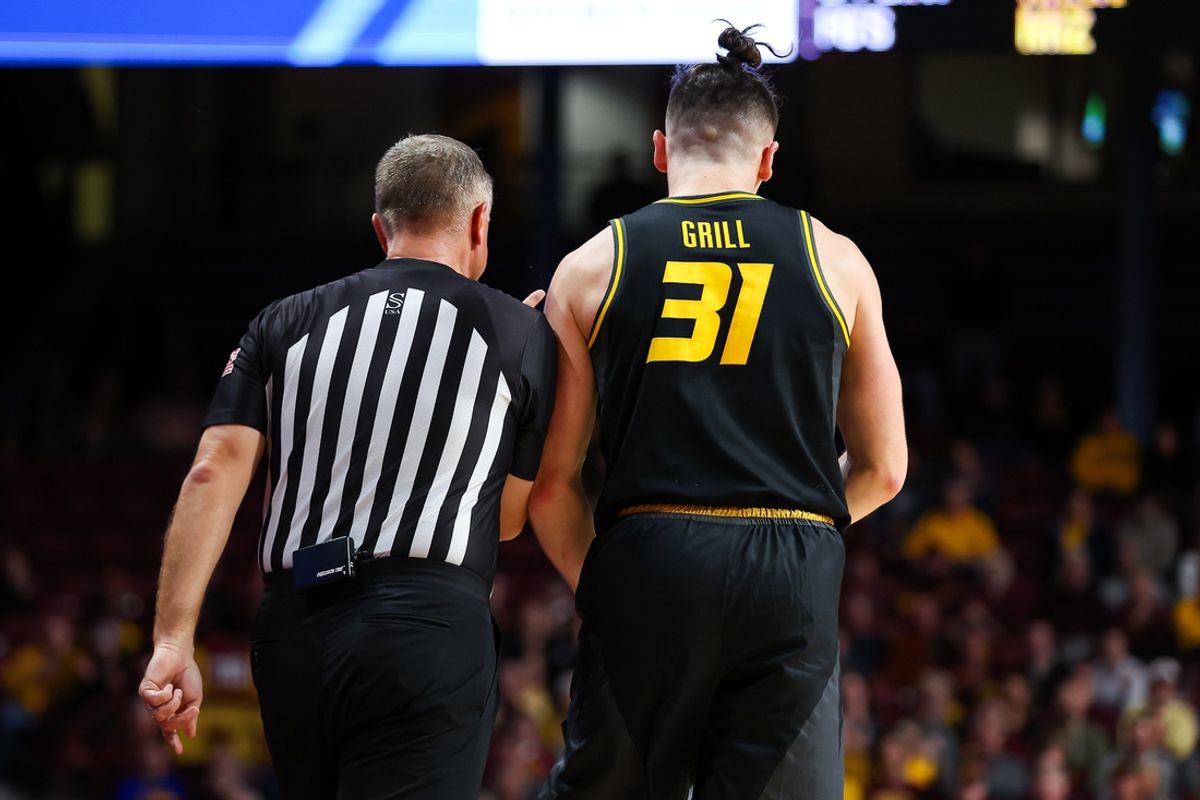 Nov 16, 2023; Minneapolis, Minnesota, USA; Missouri Tigers guard Caleb Grill (31) reacts after being charged with a technical foul against the Minnesota Golden Gophers during the second half at Williams Arena. After the initial reaction he received another technical and was ejected from the game. Mandatory Credit: Matt Krohn-Imagn Images