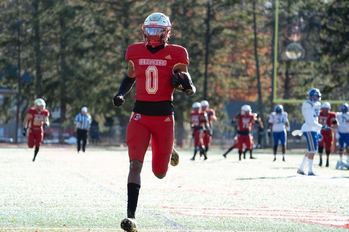 Nov 18, 2023; Oradell, NJ, USA; Donovan Catholic football at Bergen Catholic in a State, Non-Public A, semifinal game. BC #0 Quincy Porter runs for a touchdown after making a catch in the third quarter.