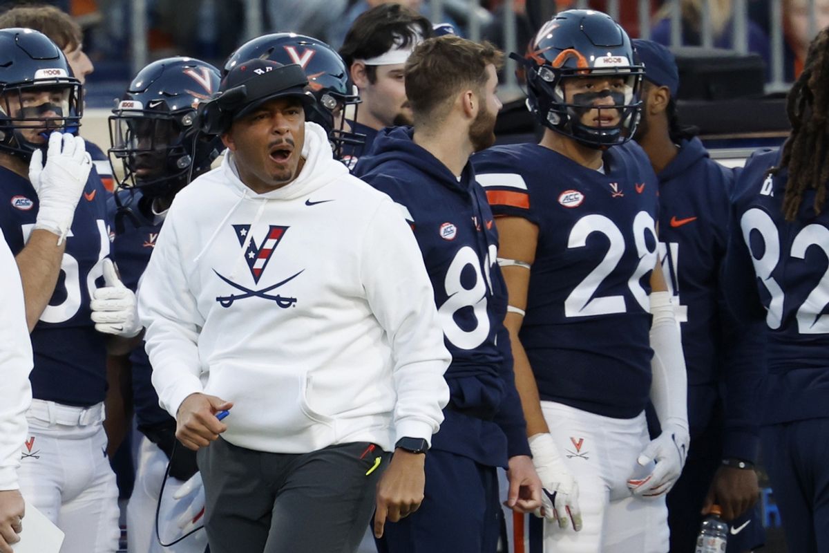 Nov 18, 2023; Charlottesville, Virginia, USA; Virginia Cavaliers head coach Tony Elliott yells at officials from the sidelines against the Duke Blue Devils during the second quarter at Scott Stadium. Mandatory Credit: Geoff Burke-Imagn Images