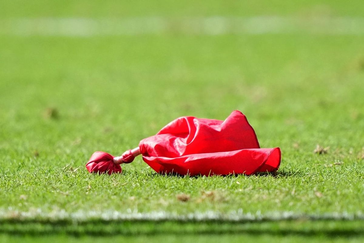 Nov 19, 2023; Miami Gardens, Florida, USA; A general view of the red challenge flag on the field during the first half between the Miami Dolphins and the Las Vegas Raiders at Hard Rock Stadium. Mandatory Credit: Jasen Vinlove-Imagn Images