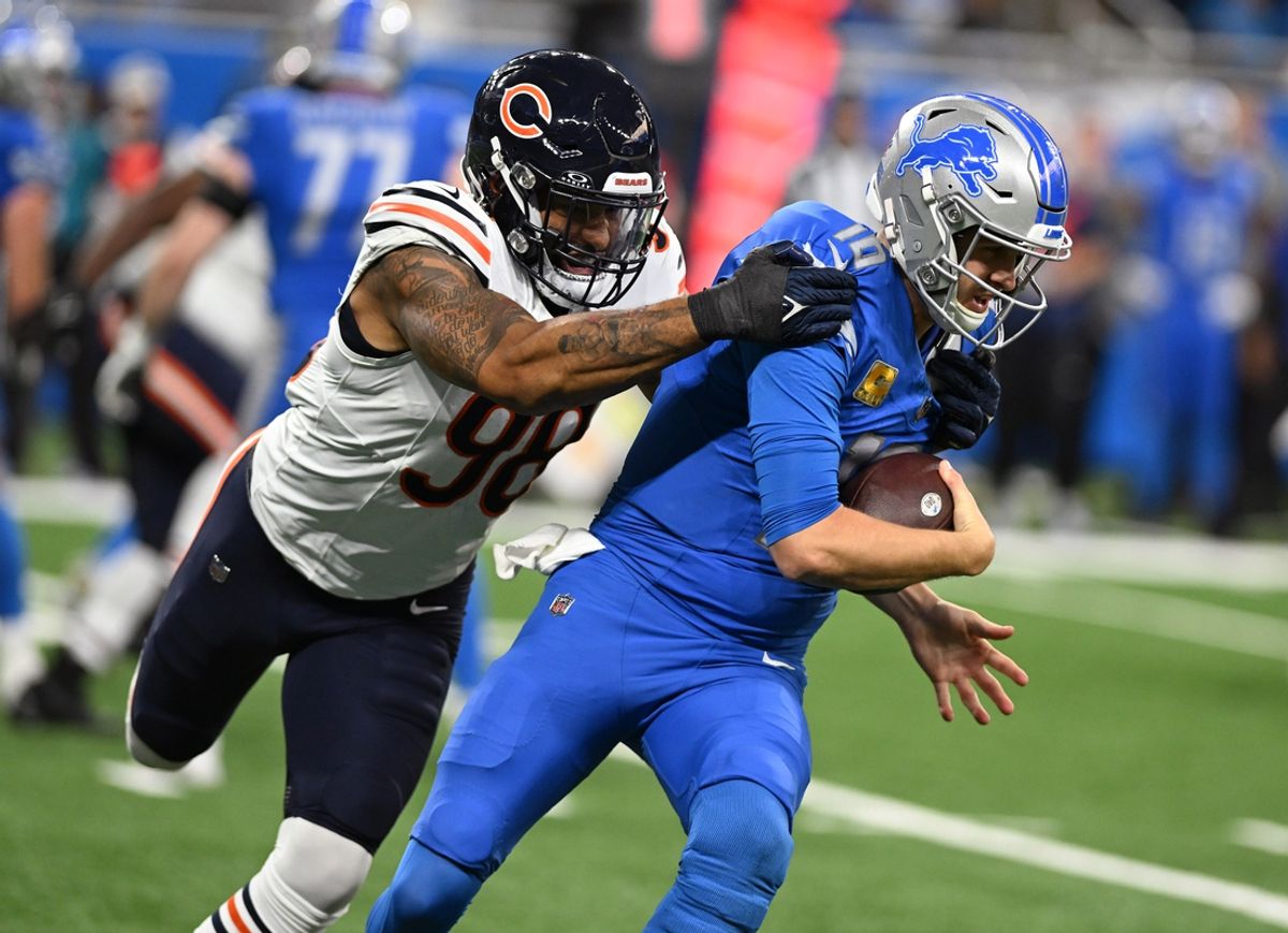Detroit Lions quarterback Jared Goff (16) is sacked by Chicago Bears defensive end Montez Sweat (98) in the fourth quarter at Ford Field. Mandatory Credit: Lon Horwedel-Imagn Images
