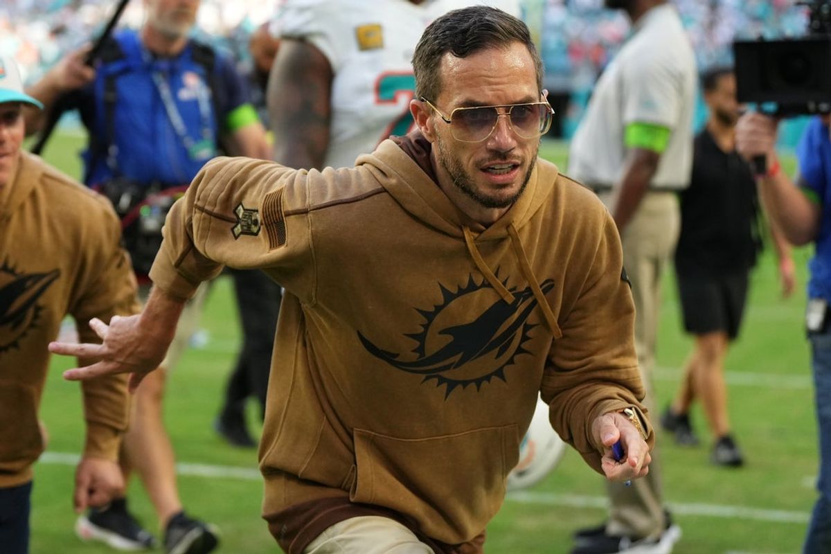 Nov 19, 2023; Miami Gardens, Florida, USA; Miami Dolphins head coach Mike McDaniel runs off the field after defeating the Las Vegas Raiders at Hard Rock Stadium. Mandatory Credit: Jasen Vinlove-Imagn Images