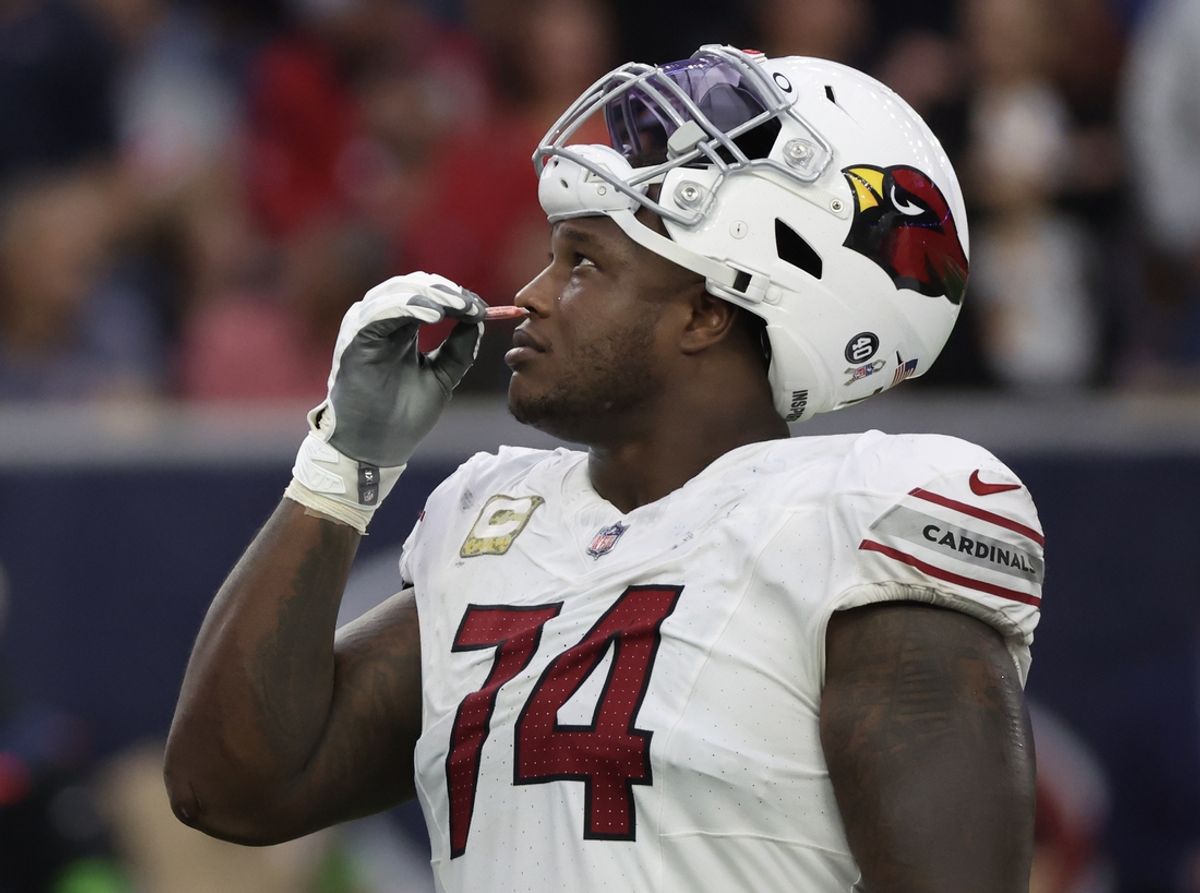 Nov 19, 2023; Houston, Texas, USA; Arizona Cardinals offensive tackle D.J. Humphries (74) smells smelling salts as he and the Houston Texans waits for a call in the second half at NRG Stadium. Mandatory Credit: Thomas Shea-Imagn Images