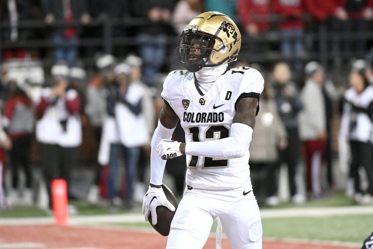 Nov 17, 2023; Pullman, Washington, USA; Colorado Buffaloes cornerback Travis Hunter (12) celebrates a touchdown against the Washington State Cougars in the first half at Gesa Field at Martin Stadium. Mandatory Credit: James Snook-USA TODAY Sports