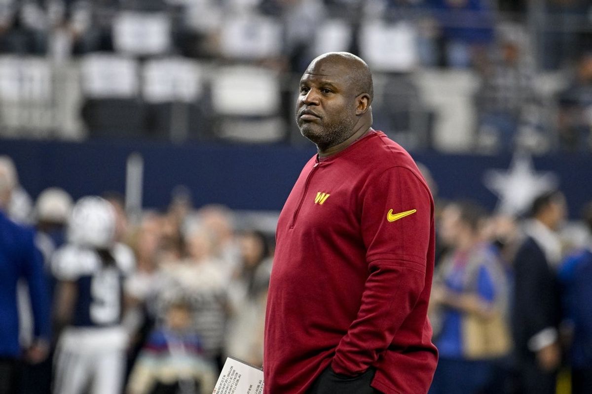 Nov 23, 2023; Arlington, Texas, USA; Washington Commanders offensive coordinator Eric Bieniemy before the game between the Dallas Cowboys and the Washington Commanders at AT&T Stadium. Mandatory Credit: Jerome Miron-Imagn Images