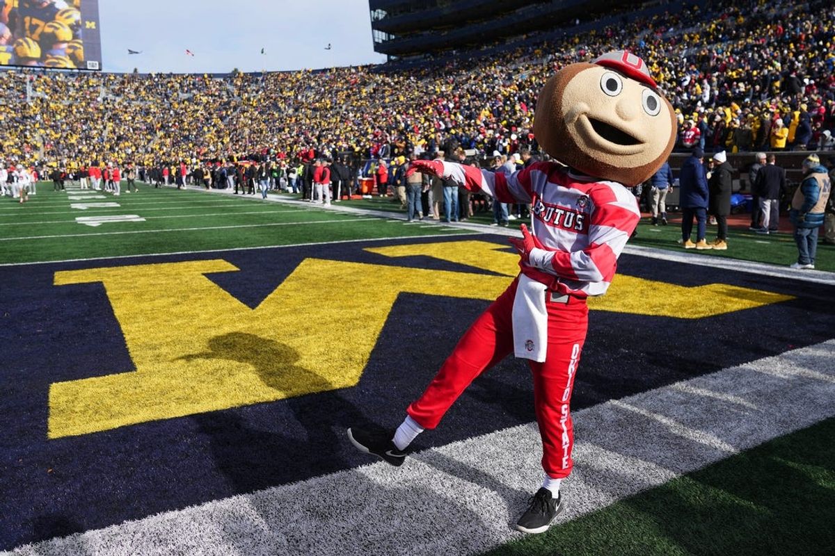 Nov 25, 2023; Ann Arbor, Michigan, USA; Ohio State Buckeyes mascot Brutus Buckeye cheers prior to the NCAA football game against the Michigan Wolverines at Michigan Stadium.