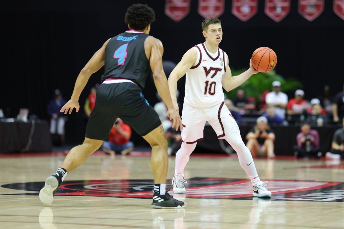 Nov 26, 2023; Kissimmee, FL, USA;  Virginia Tech Hokies guard Brandon Rechsteiner (10) passes the ball against the Florida Atlantic Owls in the first half during the ESPN Events Invitational Championship game at State Farm Field House. Mandatory Credit: Nathan Ray Seebeck-Imagn Images