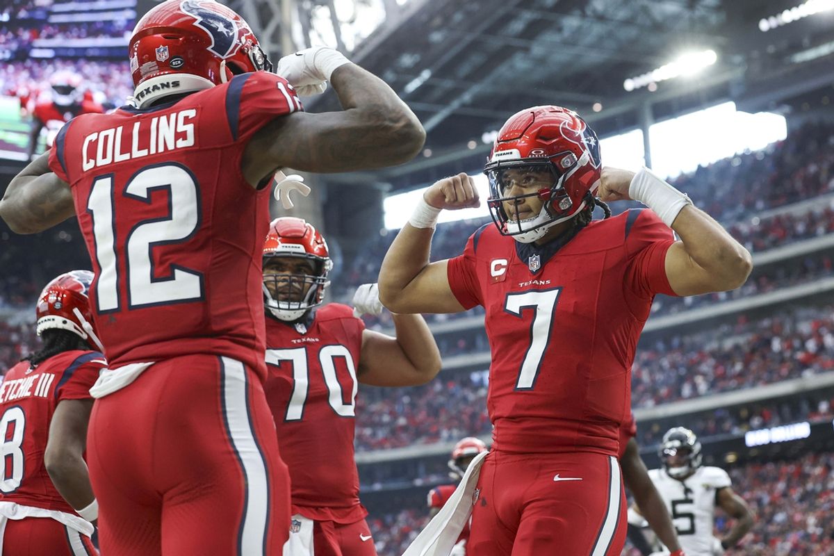 Houston Texans quarterback C.J. Stroud (7) celebrates with wide receiver Nico Collins (12) after a touchdown during the fourth quarter against the Jacksonville Jaguars at NRG Stadium. Mandatory Credit: Troy Taormina-USA TODAY Sports