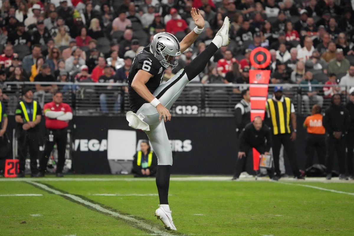 Nov 26, 2023; Paradise, Nevada, USA; Las Vegas Raiders punter AJ Cole (6) punts the ball against the Kansas City Chiefs in the second half at Allegiant Stadium. Mandatory Credit: Kirby Lee-Imagn Images