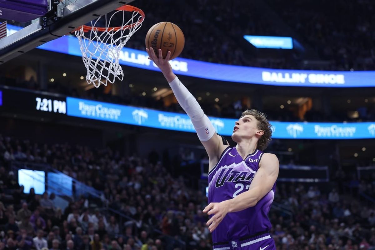 Jan 3, 2024; Salt Lake City, Utah, USA; Utah Jazz forward Lauri Markkanen (23) lays the ball up against the Detroit Pistons during the first quarter at Delta Center.
