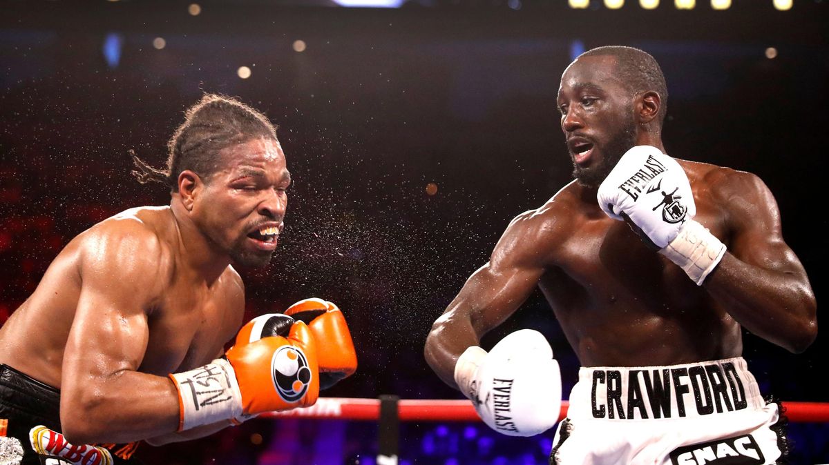 WBO champion Terence Crawford punches Shawn Porter during their welterweight title fight  in Las Vegas, Nevada.
