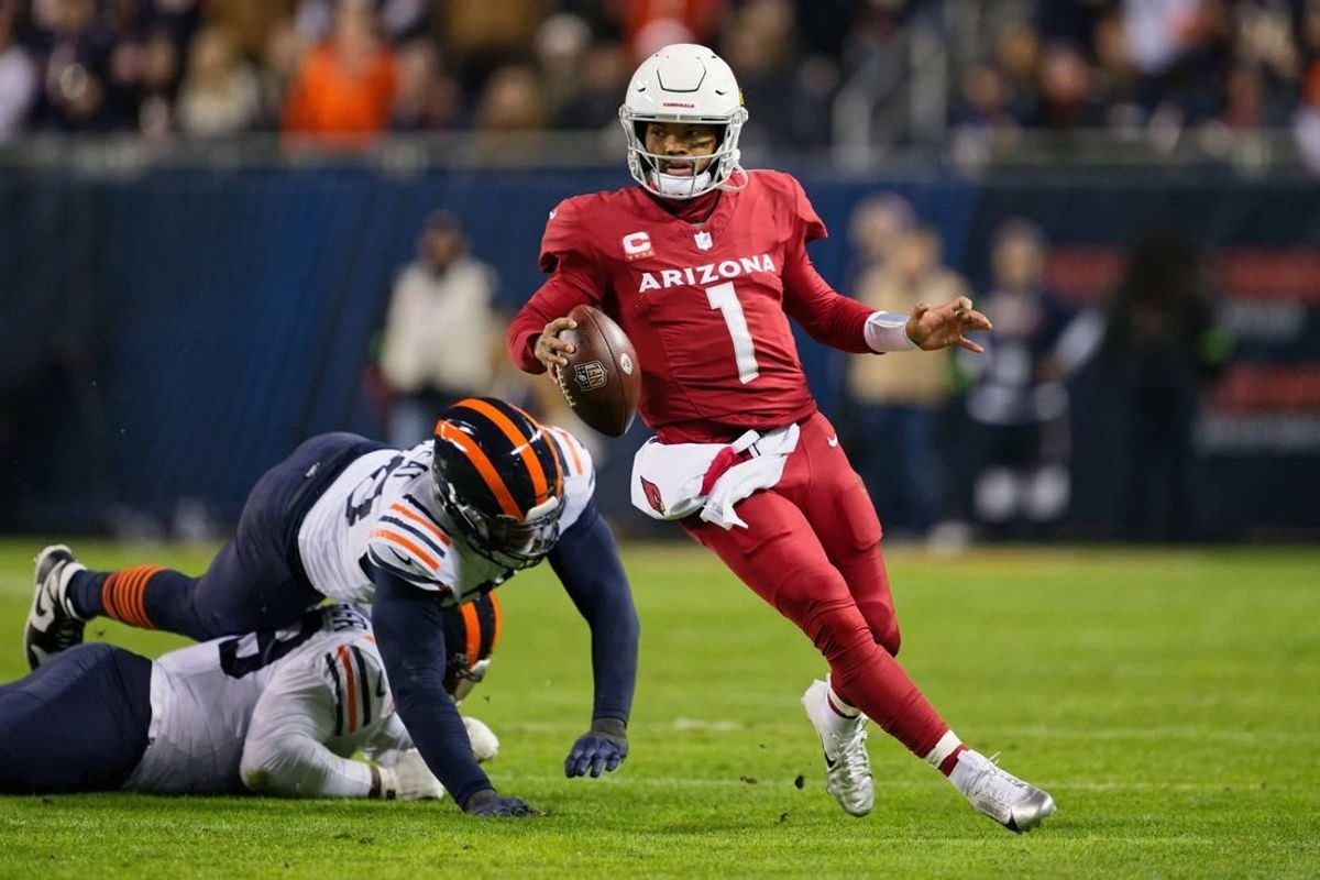 Dec 24, 2023; Chicago, Illinois, USA;  Arizona Cardinals quarterback Kyler Murray (1) runs with the ball against the Chicago Bears at Soldier Field.