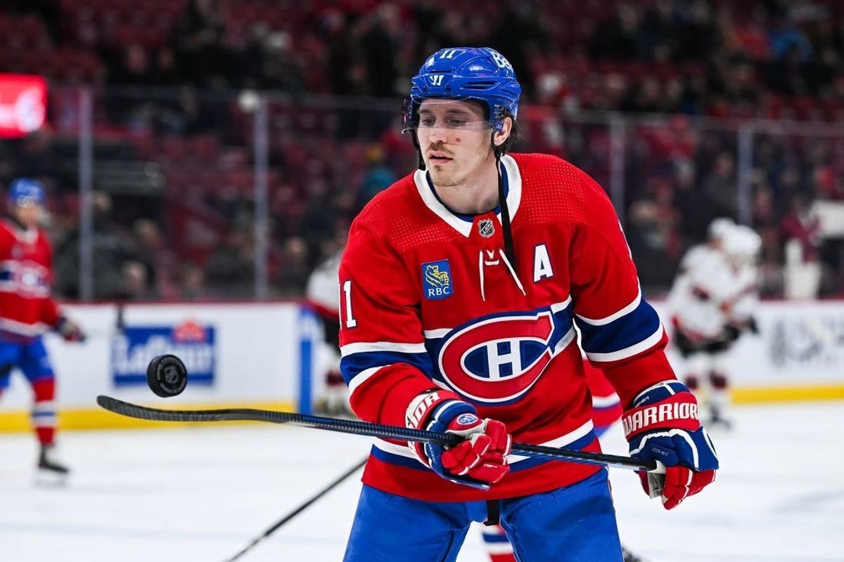 Jan 23, 2024; Montreal, Quebec, CAN; Montreal Canadiens right wing Brendan Gallagher (11) plays with a puck during a warm-up before the game against the Ottawa Senators at Bell Centre.