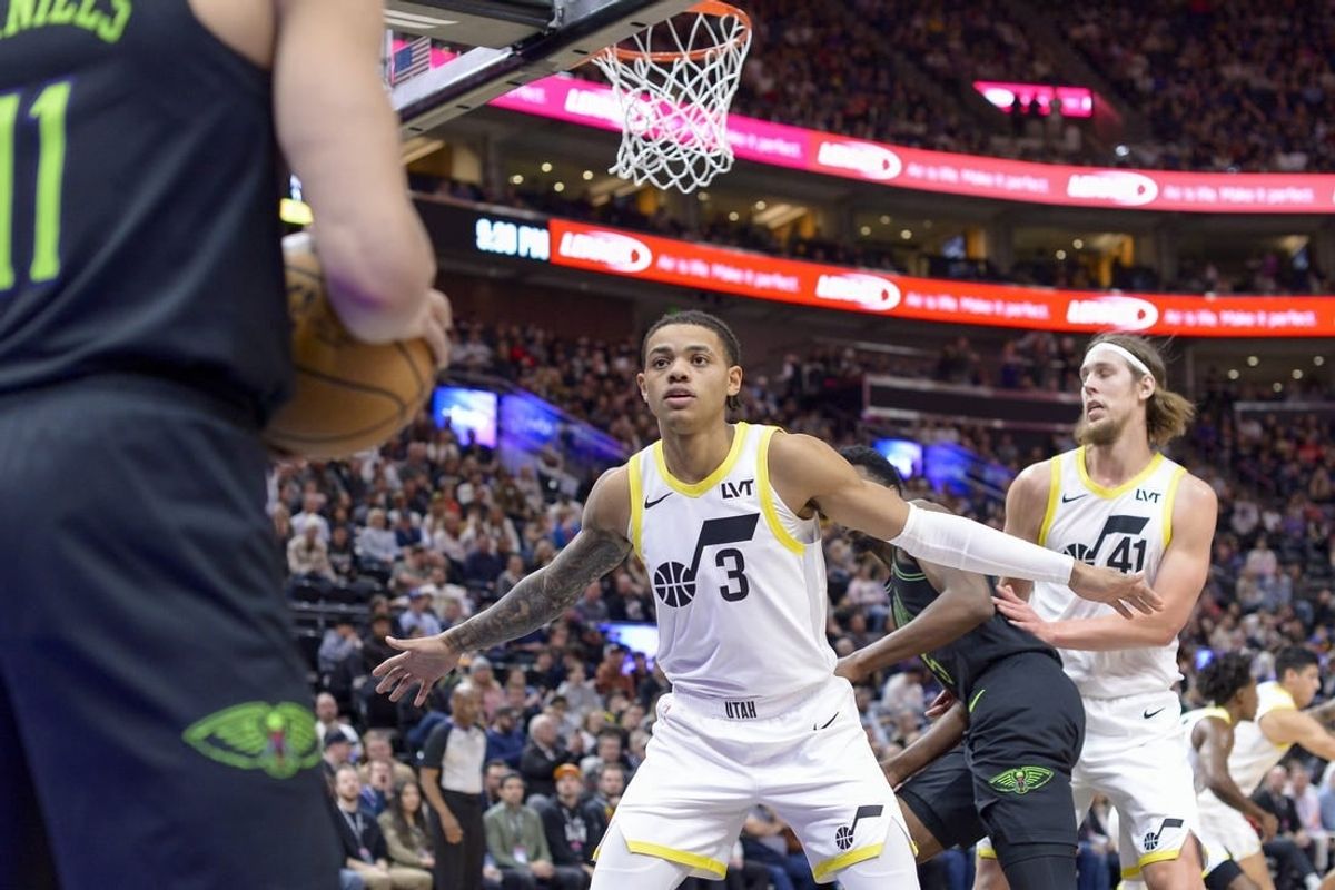 Nov 25, 2023; Salt Lake City, Utah, USA; New Orleans Pelicans guard Dyson Daniels (11) passes the ball from the baseline against Utah Jazz guard Keyonte George (3) during the second half at Delta Center.