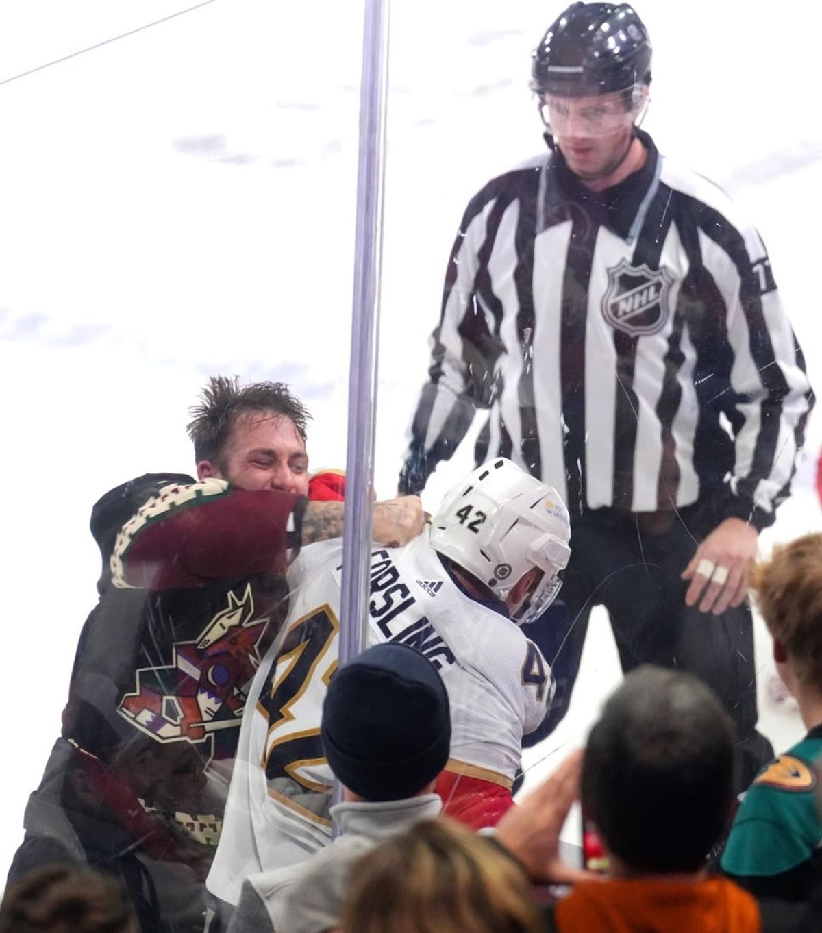 Jan 2, 2024; Tempe, Arizona, USA; Arizona Coyotes left wing Jason Zucker (16) fights Florida Panthers defenseman Gustav Forsling (42) during the second period at Mullett Arena.
