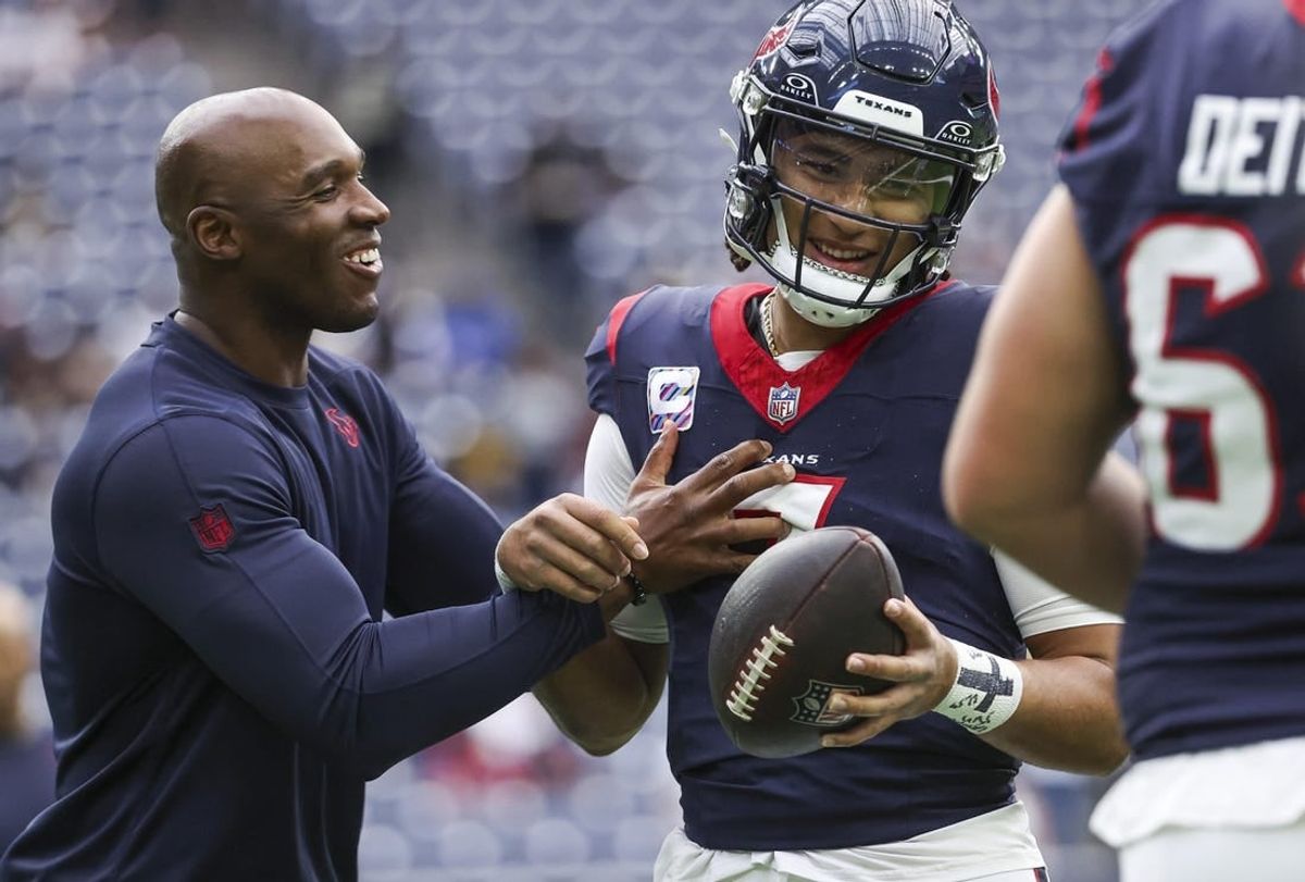 Oct 15, 2023; Houston, Texas, USA; Houston Texans head coach DeMeco Ryans laughs with quarterback C.J. Stroud (7) before the game against the New Orleans Saints at NRG Stadium.