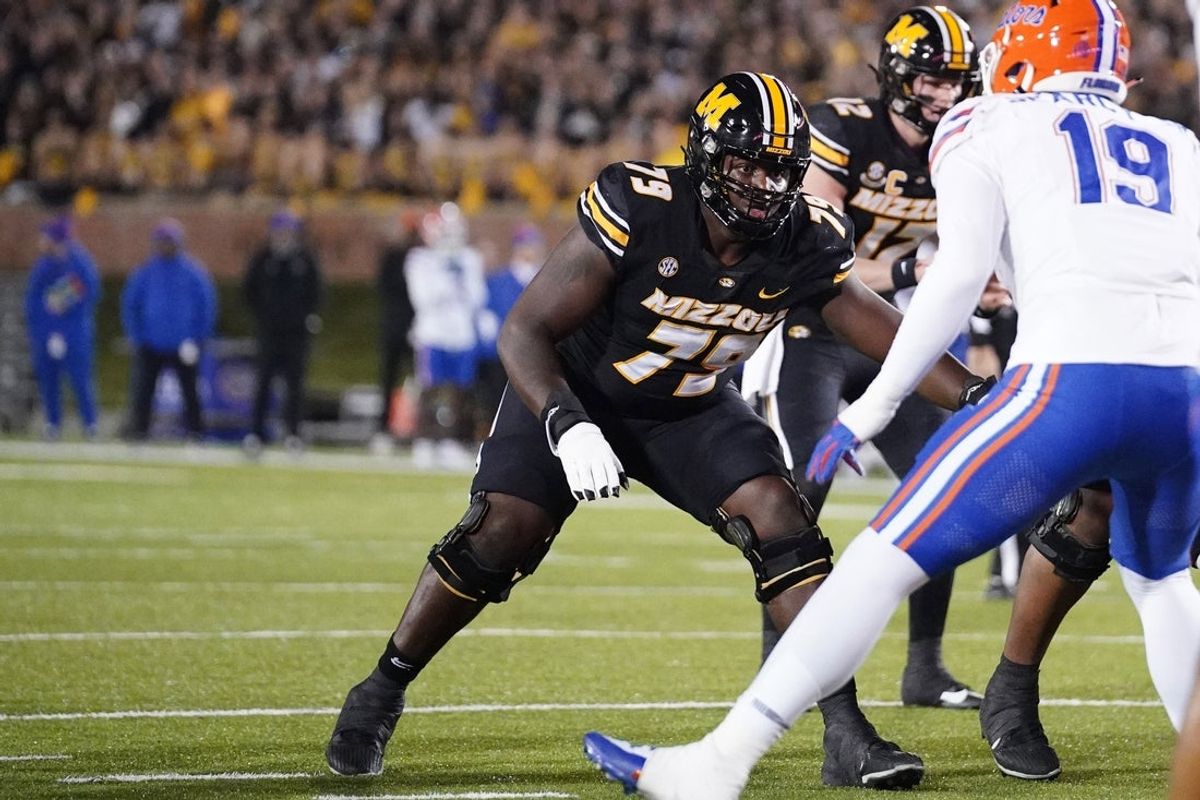 Nov 18, 2023; Columbia, Missouri, USA; Missouri Tigers offensive lineman Armand Membou (79) at the line of scrimmage against the Florida Gators during the game at Faurot Field at Memorial Stadium. Mandatory Credit: Denny Medley-Imagn Images