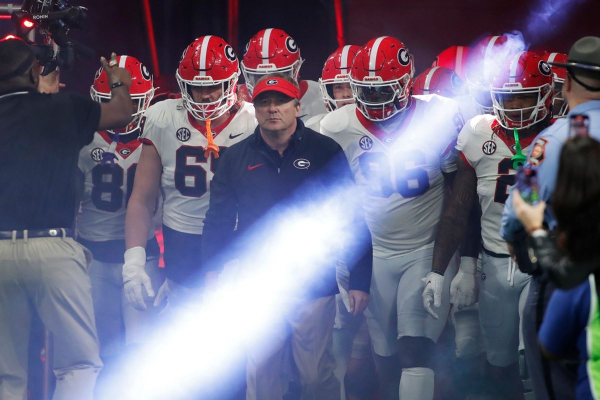 Georgia coach Kirby Smart leads his team onto the field before the start of the SEC Championship game against Alabama at Mercedes-Benz Stadium in Atlanta, on Saturday, Dec. 2, 2023.