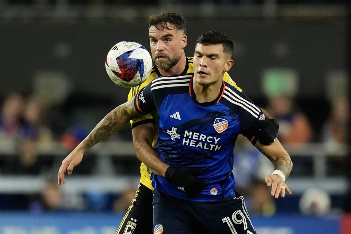 Dec 2, 2023; Cincinnati, Ohio, USA;  Columbus Crew defender Rudy Camacho (4) fights for the ball with FC Cincinnati forward Brandon Vazquez (19) during the second half of the MLS Cup Eastern Conference Finals at TQL Stadium. Mandatory Credit: Adam Cairns-Imagn Images