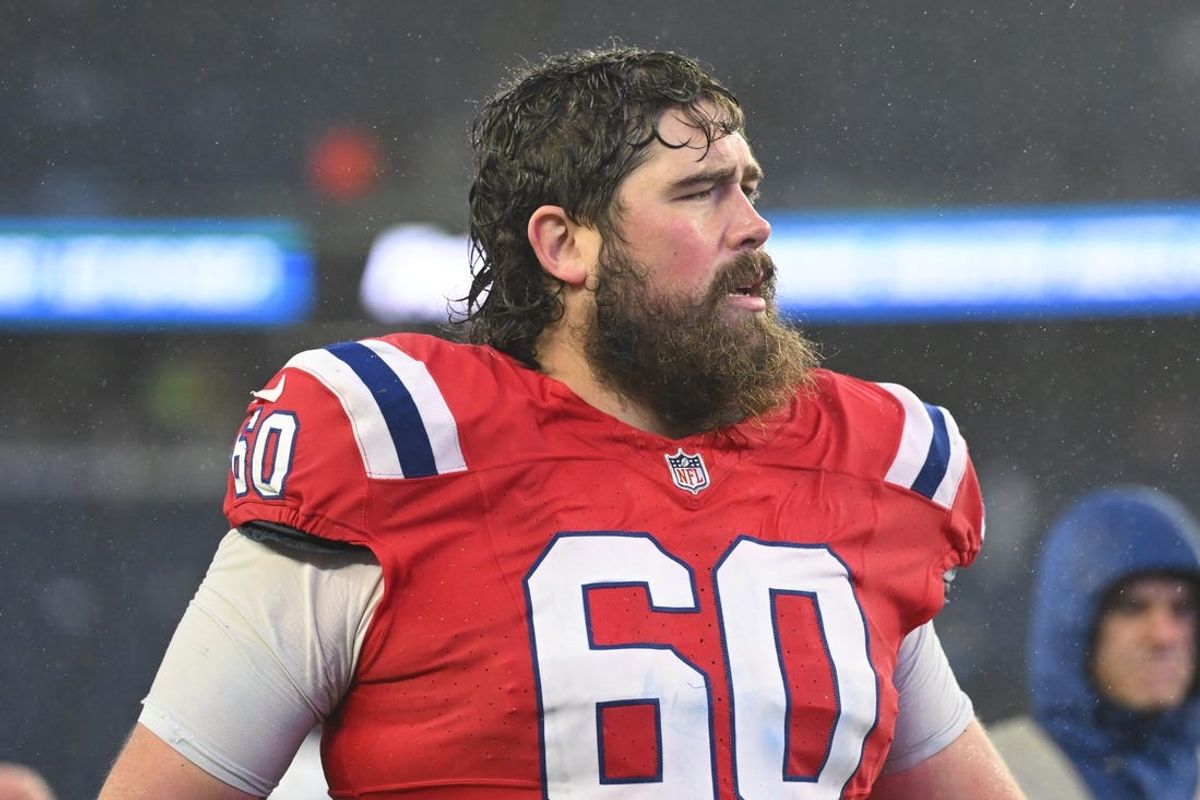 Dec 3, 2023; Foxborough, Massachusetts, USA; New England Patriots center David Andrews (60) walks off of the field after a game against the Los Angeles Chargers at Gillette Stadium. Mandatory Credit: Brian Fluharty-USA TODAY Sports