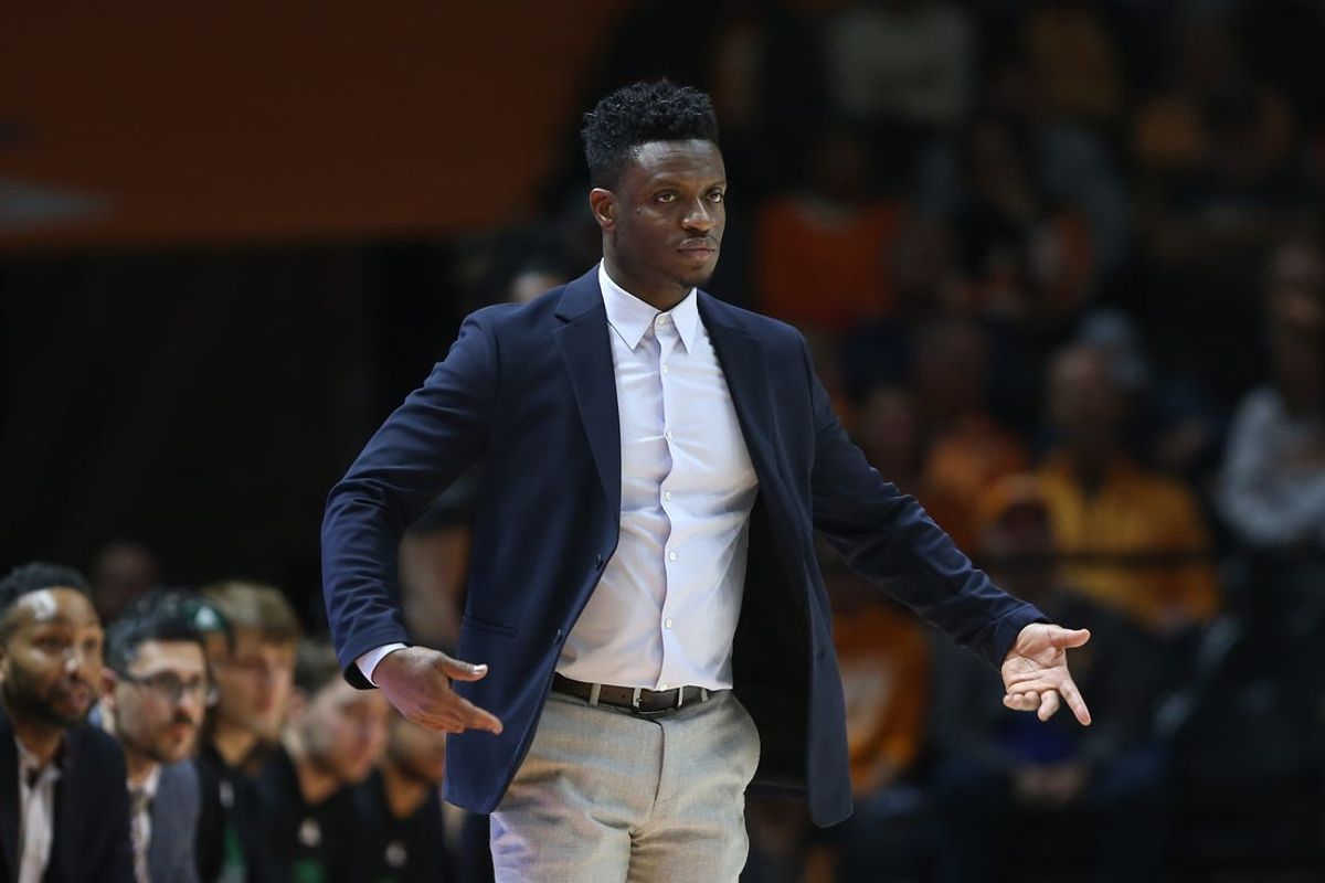 Dec 5, 2023; Knoxville, Tennessee, USA; George Mason Patriots head coach Tony Skinn gestures during the first half against the Tennessee Volunteers at Thompson-Boling Arena at Food City Center. Mandatory Credit: Randy Sartin-USA TODAY Sports